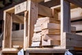 Pieces of cut wood are in crates in a work shop Royalty Free Stock Photo