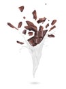 Pieces of dark chocolate with milk splashes on a white background Royalty Free Stock Photo