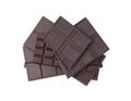 Pieces of delicious dark chocolate bars isolated on white, top view Royalty Free Stock Photo