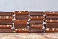 Pieces of different milk chocolate are carefully laid out in a staggered order Royalty Free Stock Photo