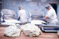 Pieces of dough, dumpling production. Chefs make dumplings, industry