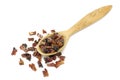 Pieces of dried tuna in a wooden spoon