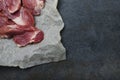 Slices of raw meat on backing paper in the kitchen Royalty Free Stock Photo