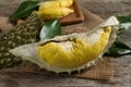 Pieces of fresh ripe durian fruit on wooden table, closeup Royalty Free Stock Photo