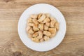 Pieces of fried chicken meat in white plate on table Royalty Free Stock Photo