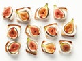 Pieces of glazed figs on a piece of bread spread with cream cheese. White background