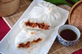 Pieces of Half Pork Bun on Plate Royalty Free Stock Photo