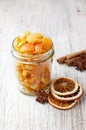 Pieces of candied orange peel coated in sugar in jar Royalty Free Stock Photo