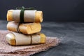 Pieces of household soap tied with jute rope, antique wooden background. Eco-friendly product - the concept of cleanliness and hea