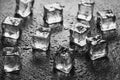 Pieces of ice cubes with water droops on black background. Royalty Free Stock Photo