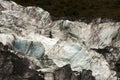 Pieces of ice fall from the Fox Glacier, New Zealand, South Island Royalty Free Stock Photo