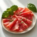 pieces of jamon with basil white background