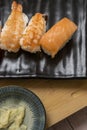 Pieces of Japanese nigiri with salmon, prawns and white rice with vinegar