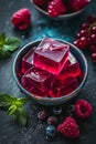 Pieces of jelly with berries. Selective focus. Royalty Free Stock Photo