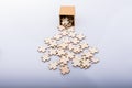 Pieces of jigsaw puzzle out of box as problem solution concept Royalty Free Stock Photo