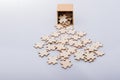 Pieces of jigsaw puzzle out of box as problem solution concept Royalty Free Stock Photo
