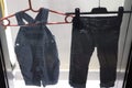 Pieces of kids pants jeans in window