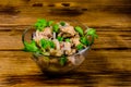 Pieces of the marinated carp fish in glass bowl on wooden table Royalty Free Stock Photo