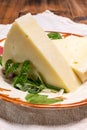 Pieces of matured pecorino romano italian cheese made from sheep milk in Lazio, Sardinia or Tuscany Royalty Free Stock Photo