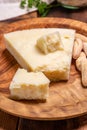 Pieces of matured pecorino romano italian cheese made from sheep milk in Lazio, Sardinia or Tuscany Royalty Free Stock Photo