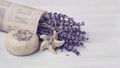 Pieces of natural handcrafted soap scrub. coldprocess. fragrance essential oil of lavender. bouquet of dry lavender on light