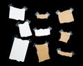 Pieces of notepaper on black background