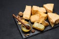 Pieces of parmesan or parmigiano cheese and honey