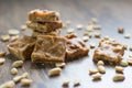 Pieces of peanut caramels on the table