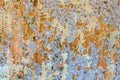 Pieces of peeled paint on wall surface Royalty Free Stock Photo