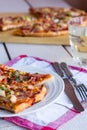 Pieces pizza with sausage, chicken, corn and cheese Royalty Free Stock Photo