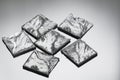 Pieces of polycrystalline silicon on grey background