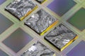 Pieces of polycrystalline silicon integrated on a polysilicon substrate with microchips Royalty Free Stock Photo