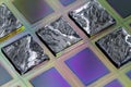 Pieces of polycrystalline silicon integrated on a polysilicon substrate with microchips Royalty Free Stock Photo