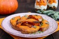 Pieces of pumpkin baked with herbs Royalty Free Stock Photo