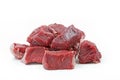Pieces of raw beef goulash on white Royalty Free Stock Photo