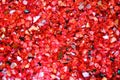 Texture of broken glass pieces, payment red glitter background. Holidays, Christmas, Valentine, love abstract texture Royalty Free Stock Photo