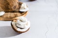 Pieces of ripe coconut on the table. Tropical fruits. Natural source of antioxidants. Copy space Royalty Free Stock Photo