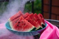 Pieces of ripe juicy watermelon on a plate in the morning for breakfast Royalty Free Stock Photo