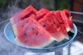 Pieces of ripe juicy watermelon on a plate in the morning for breakfast Royalty Free Stock Photo