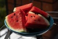 Pieces of ripe juicy watermelon on a plate in the morning for breakfast Royalty Free Stock Photo