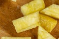 pieces of ripe pineapple sliced on a board Royalty Free Stock Photo