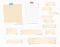 Pieces of ripped white, brown blank note paper, colorful sticky, adhesive tapes are stuck on wall Royalty Free Stock Photo
