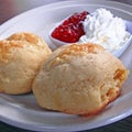 2 pieces of Scone with Cream and Strawberry Jam Royalty Free Stock Photo