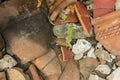 Pieces of shattered and broken terracotta pots scattered on the ground Royalty Free Stock Photo