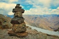 pieces of stones balancing over another as a symbol of peace of mind and balance