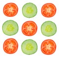 pieces of tomatoes and cucumber on a white background, slice cucumber ans tomato on white Royalty Free Stock Photo