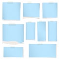 Pieces of torn blue grainy note paper with