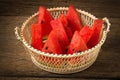 pieces watermelon in basket on old wooden Royalty Free Stock Photo