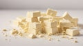 Pieces of white chocolate on a white background isolated. The view from top