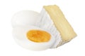 pieces of white mould cheese and eggs isolated on white Royalty Free Stock Photo